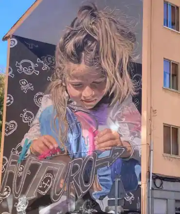 Mural en Guardo del artista 'Dadospuntocero'